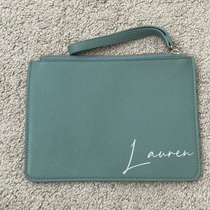 Monogram “Lauren” zip wristlet